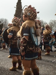 a group of people that are standing in the street