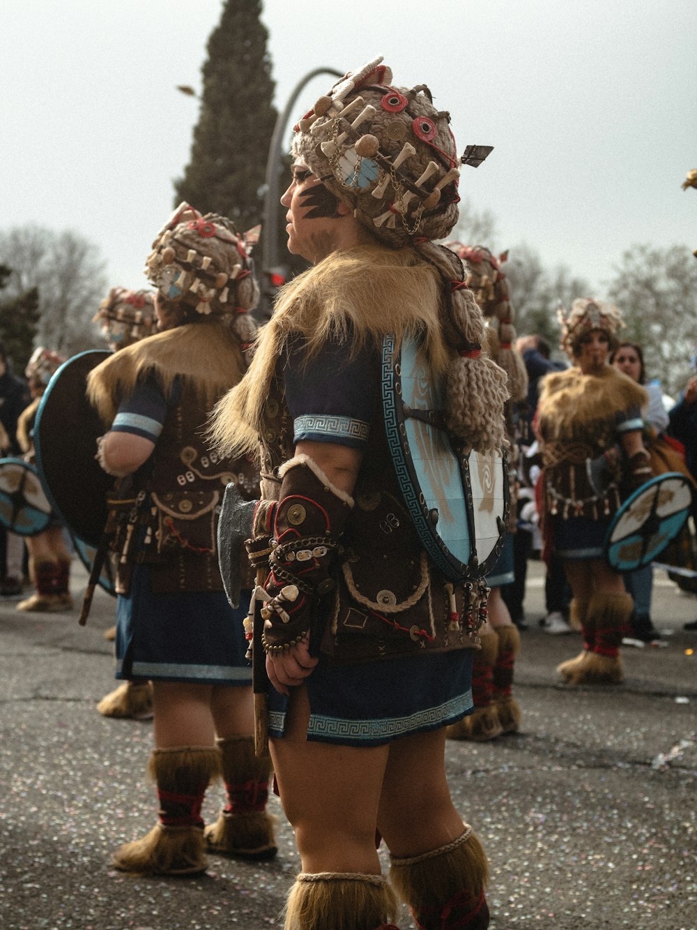 a group of people that are standing in the street