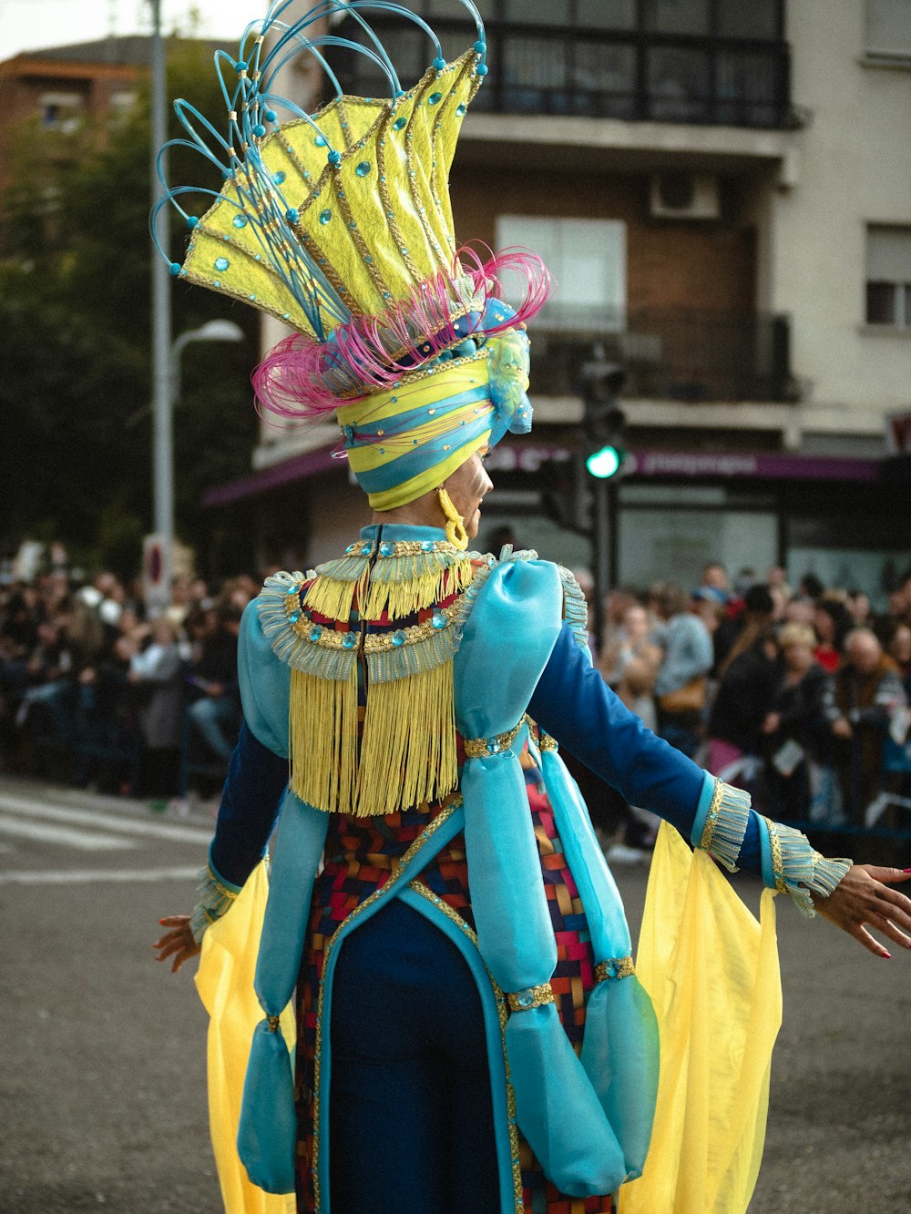 a person in a costume walking down a street