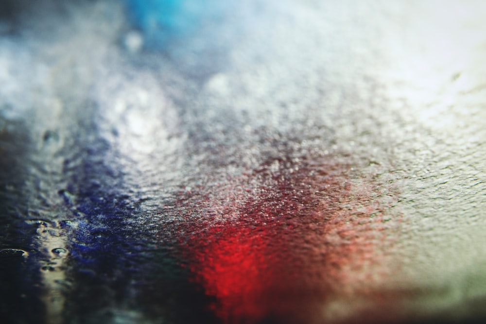 a close up of a rain covered window