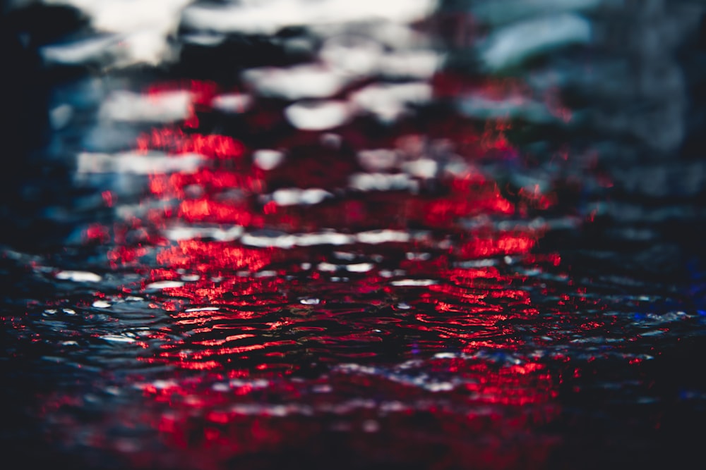a close up of a red and black umbrella