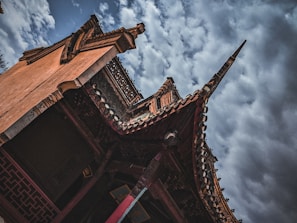 Before and after shot of a residential roof replacement showing dramatic improvement
