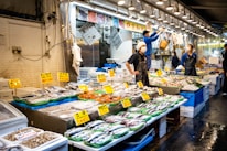 Freshly caught seafood displayed on ice at a local Balikpapan fish market.