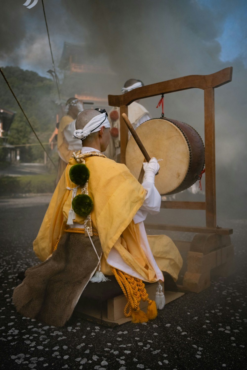 a group of people dressed in costumes playing musical instruments