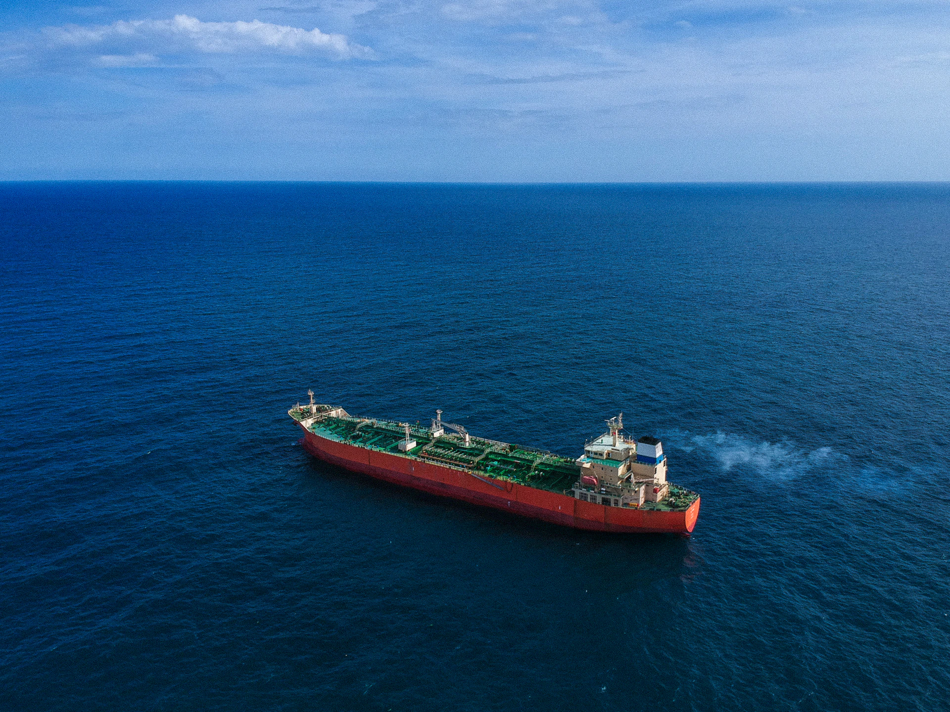 a large boat in the middle of the ocean