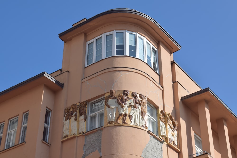 a tall building with a clock on the side of it