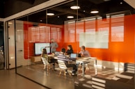 A team collaborating in a bright conference room.