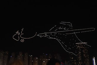 A dynamic PvP night scene with guild members dueling under glowing neon skies, showcasing their unique anime-inspired avatars.