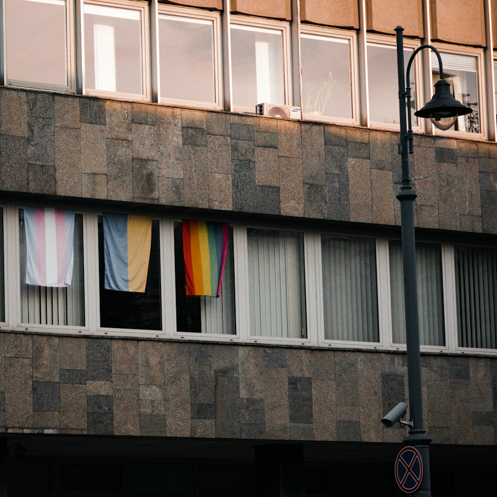 a building that has a bunch of clothes hanging out of a window