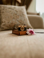 Close-up of a stylish camera inside the villa photo booth capturing a joyful smile.