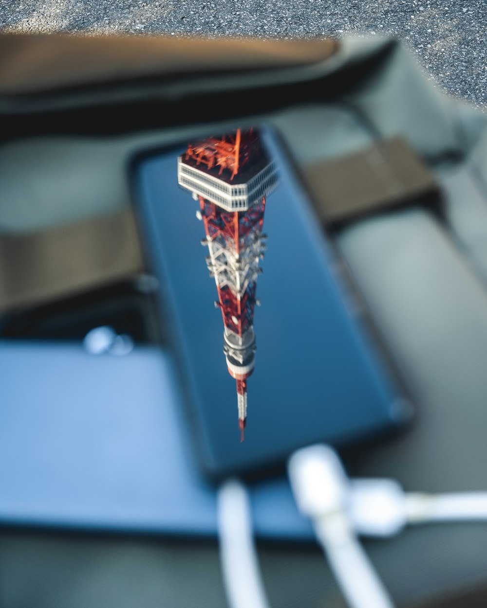 a cell phone with a picture of a tower on it