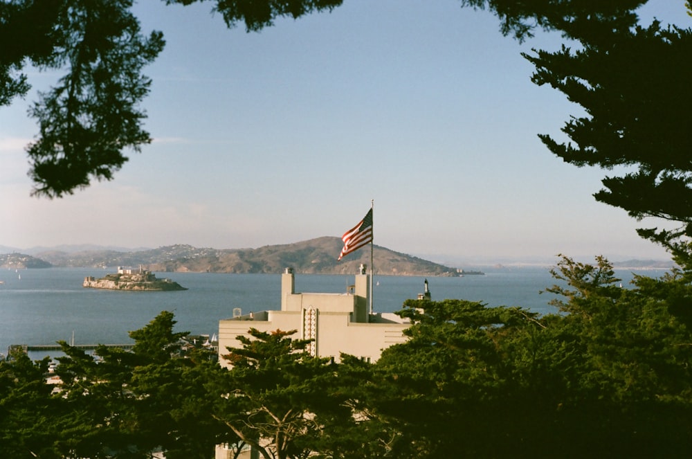 a view of a building with a flag on top of it