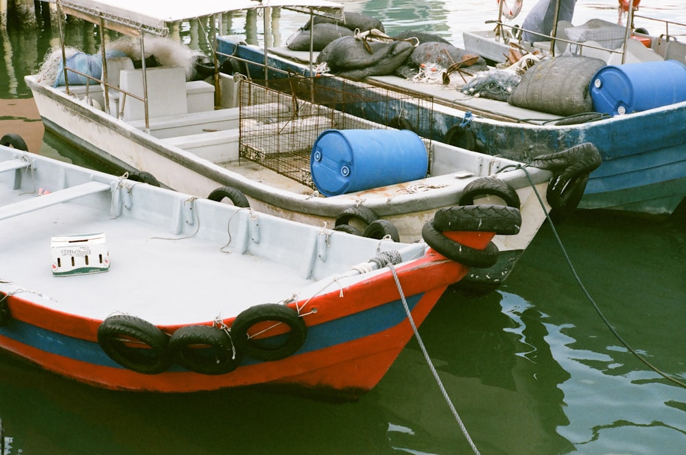 a couple of boats that are sitting in the water