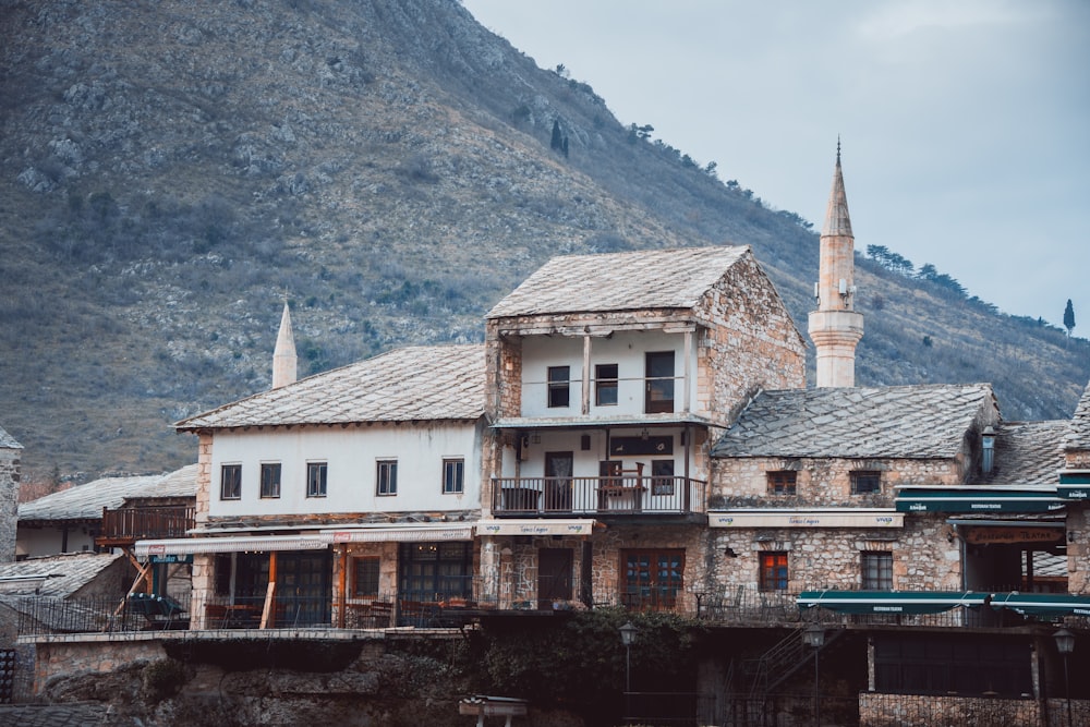 an old building with a steeple in the background