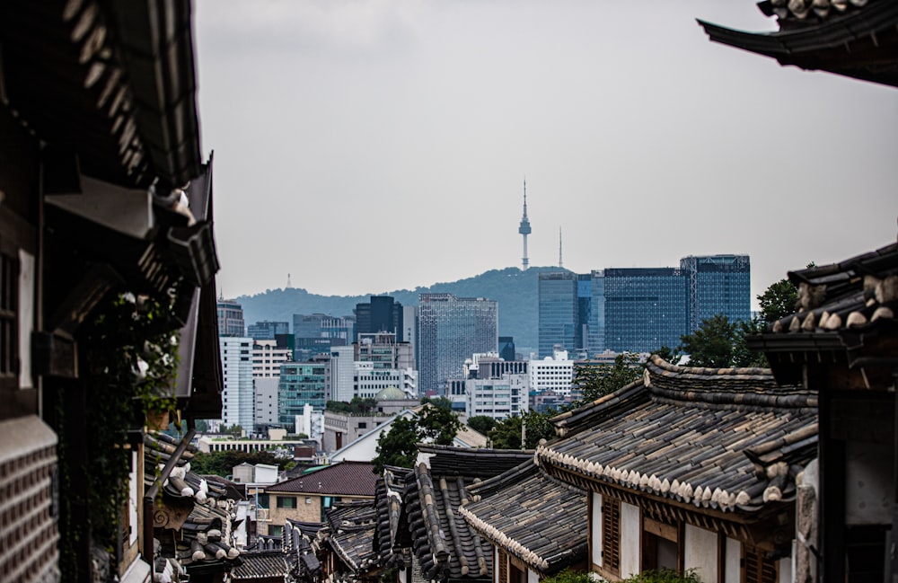 a view of a city with tall buildings