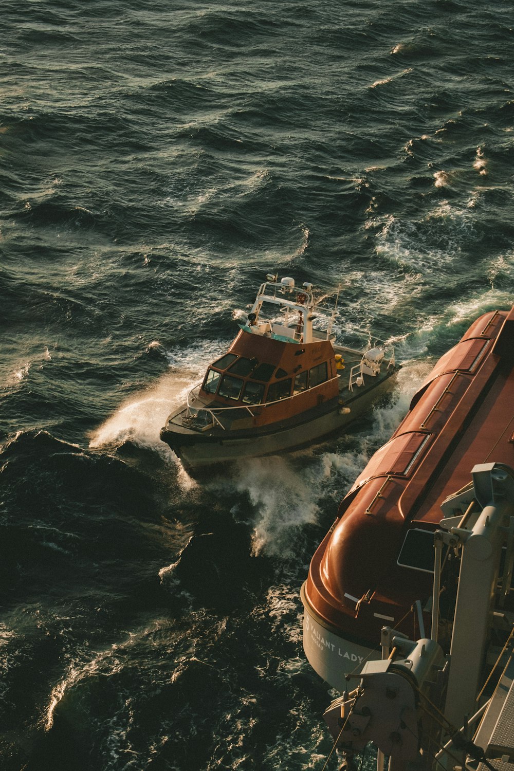 a small boat in the middle of a body of water