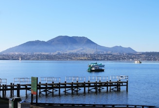 a large body of water with a boat in it