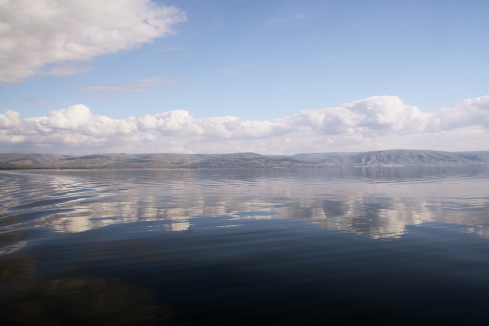 a large body of water surrounded by mountains