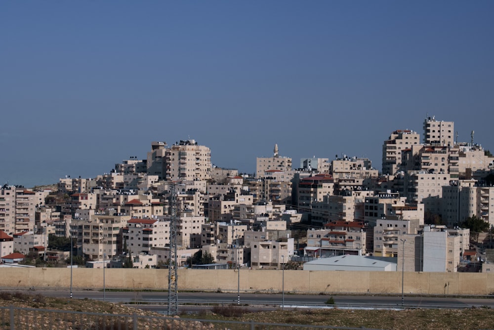 a city with lots of tall buildings on top of it