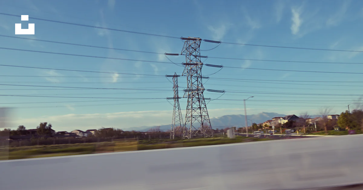 A view of a power line from a moving car photo – Free Panning shot ...