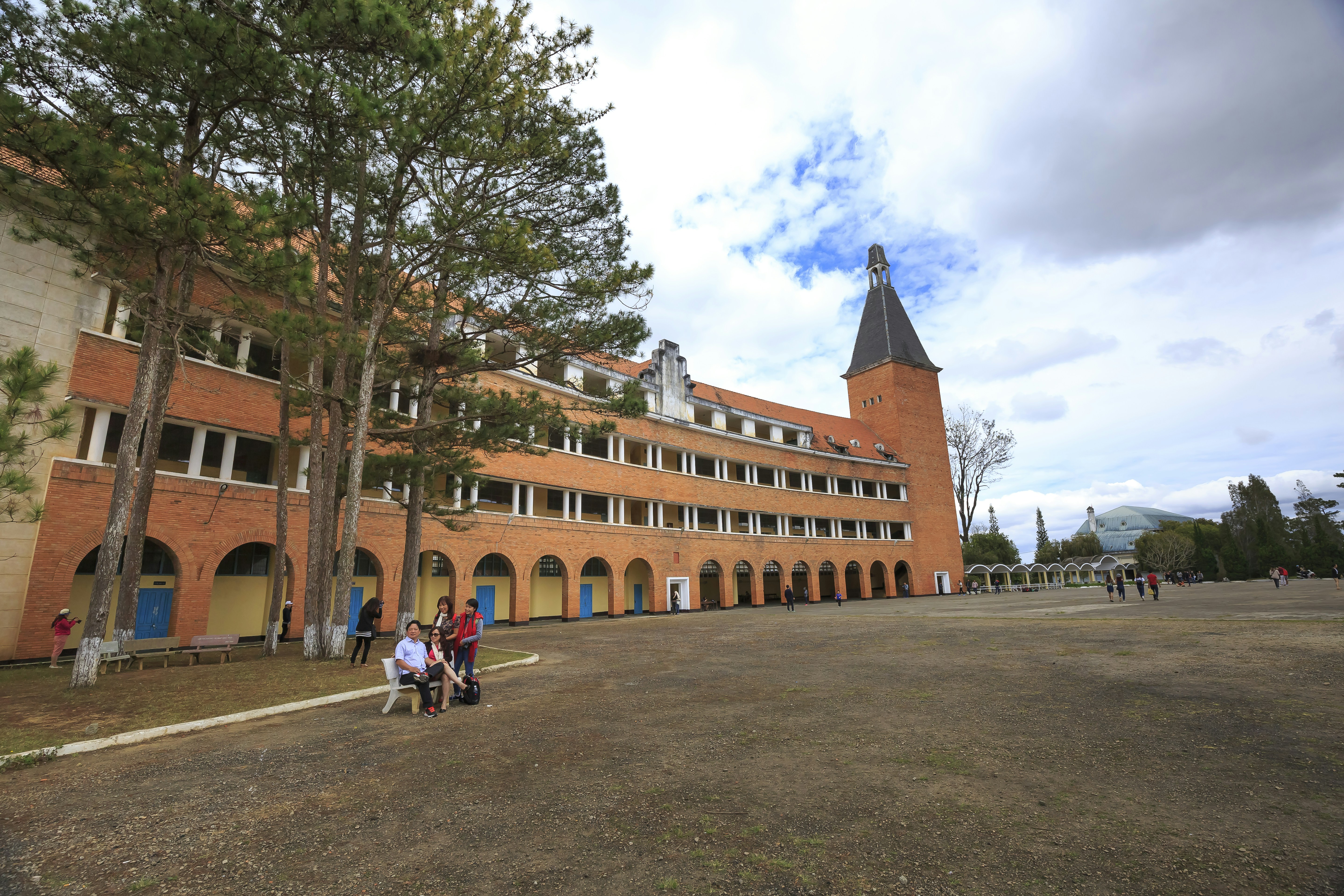 a group of people standing in front of a building