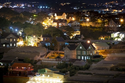 Evening view of Namsan Hills villas glowing warmly under soft outdoor lighting.