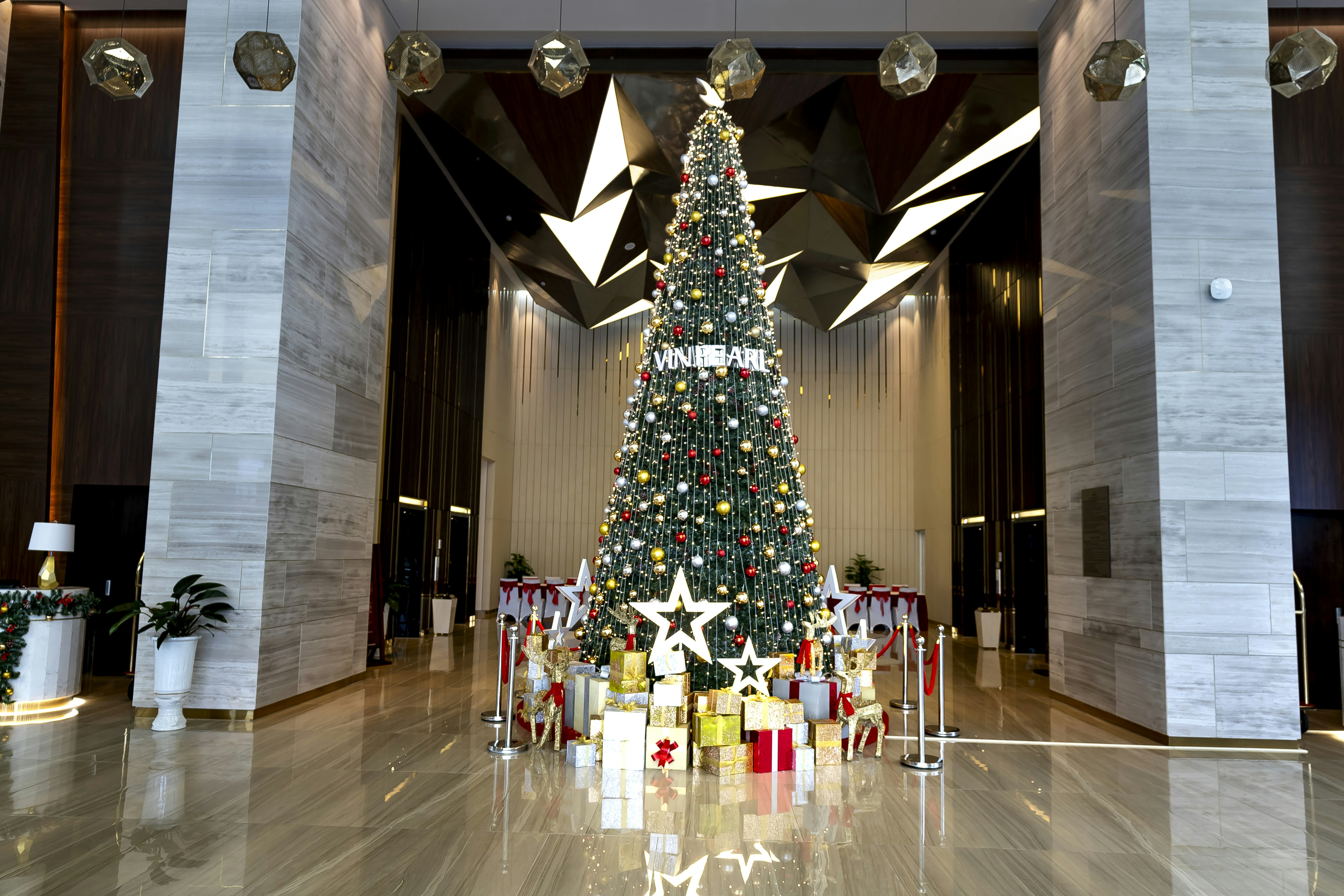 a luxurious hotel lobby decorated for Christmas, like The Ritz - christmas hotel packages london 2025