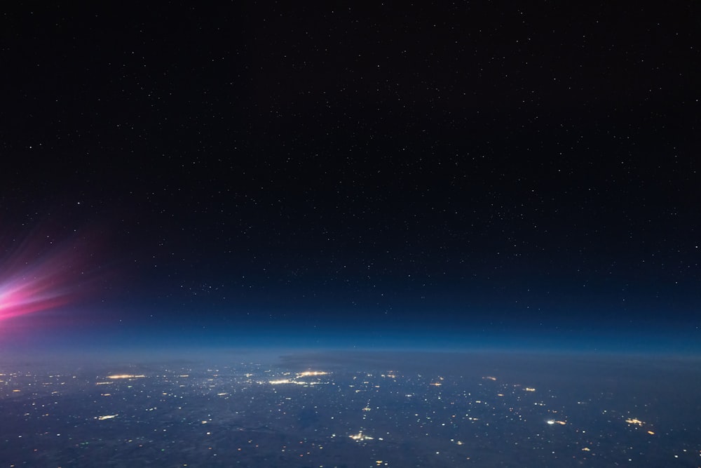 a view of the night sky from an airplane