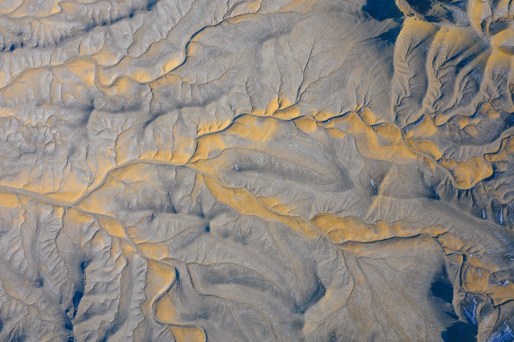 an aerial view of a mountain range in the desert