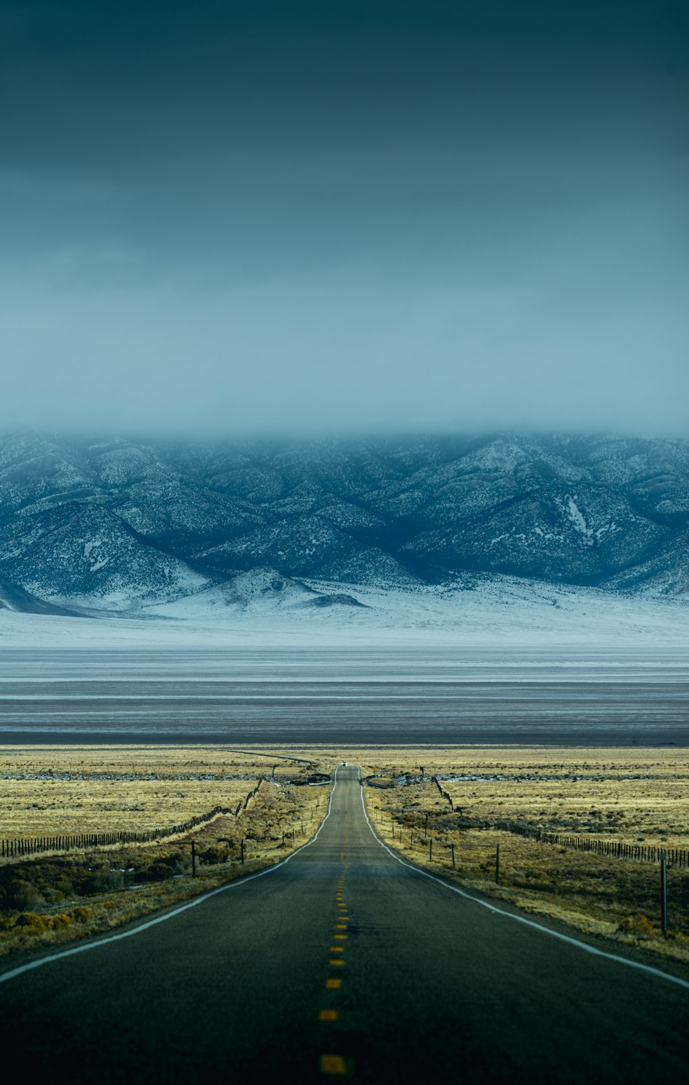 an empty road in the middle of nowhere