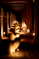 A peaceful consultation scene with warm lighting and spiritual symbols.