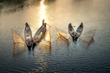 Traditional fishing boat on calm waters near Panguí, with local fishermen preparing their nets.