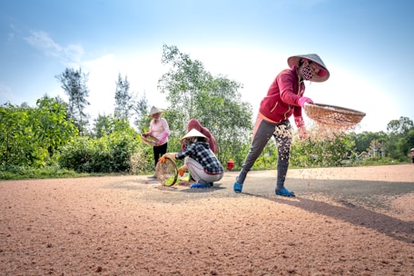 Farmers in Timor Barat attending a hands-on training session outdoors.
