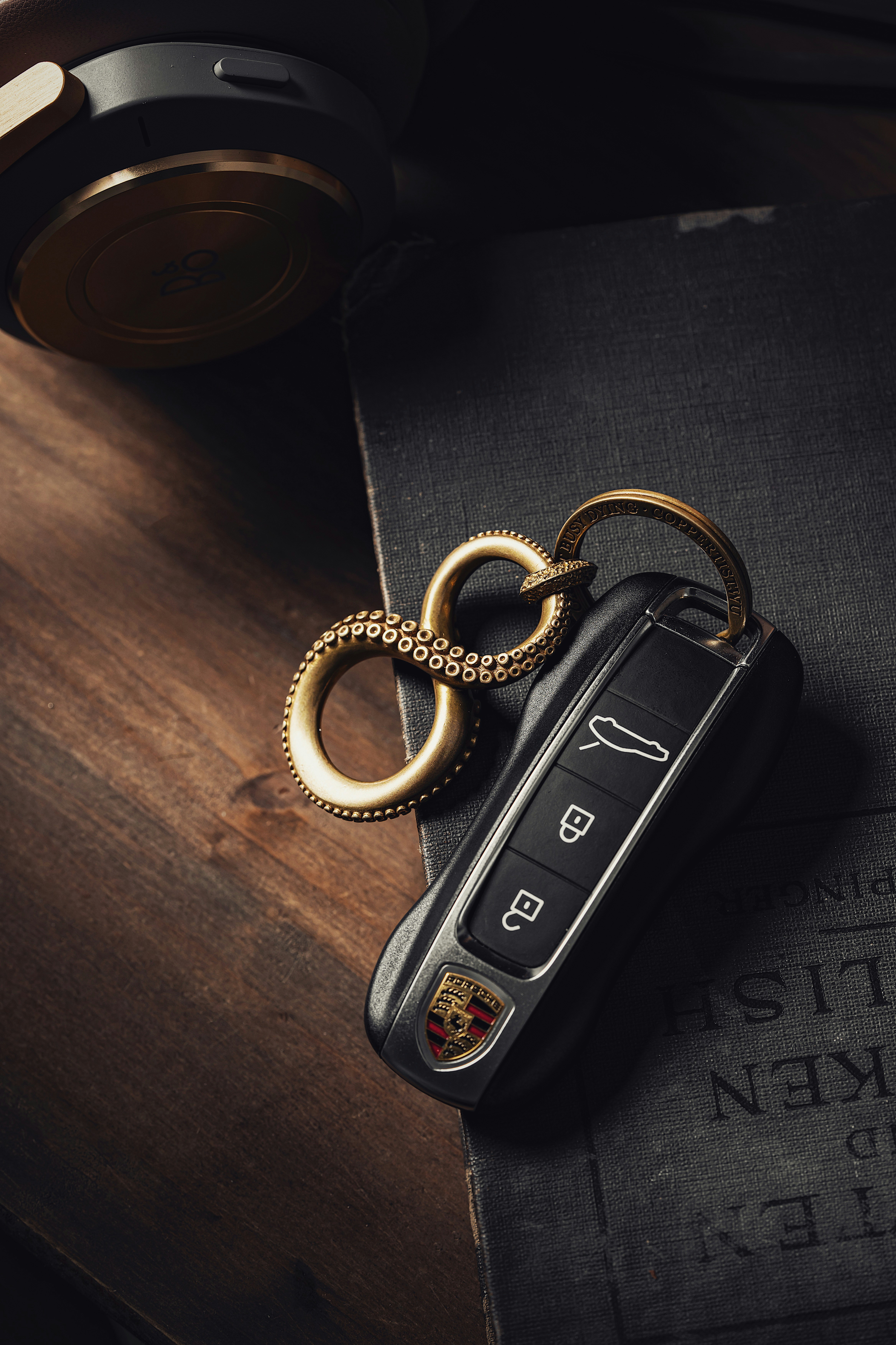 a pair of keys sitting on top of a book