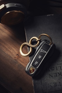 a pair of keys sitting on top of a book