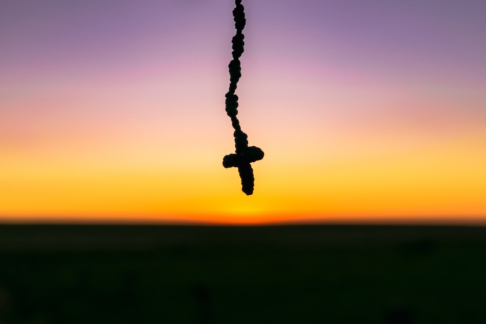 a long string of beads hanging from a string