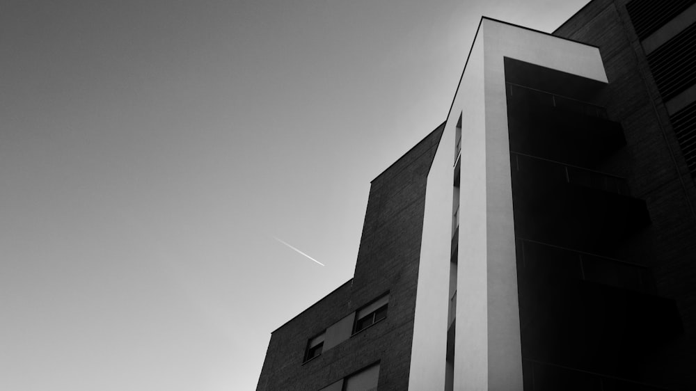 a black and white photo of a tall building