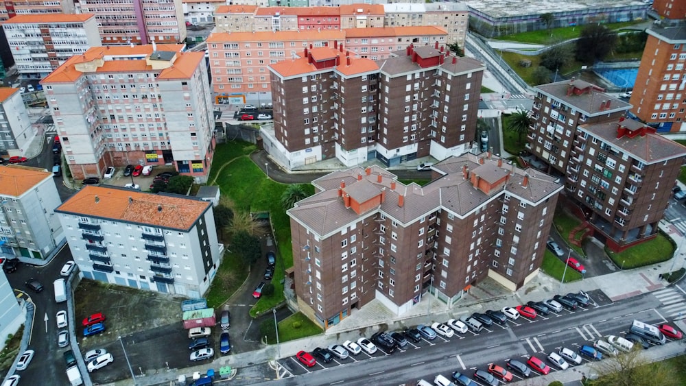 an aerial view of a city with many tall buildings