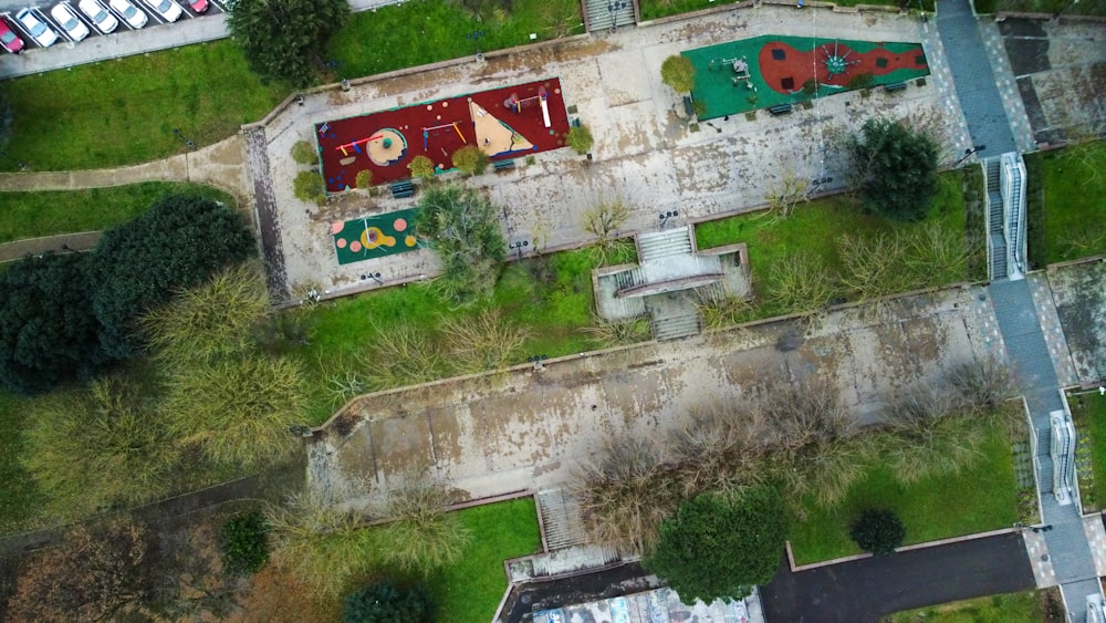 an aerial view of a park with a playground