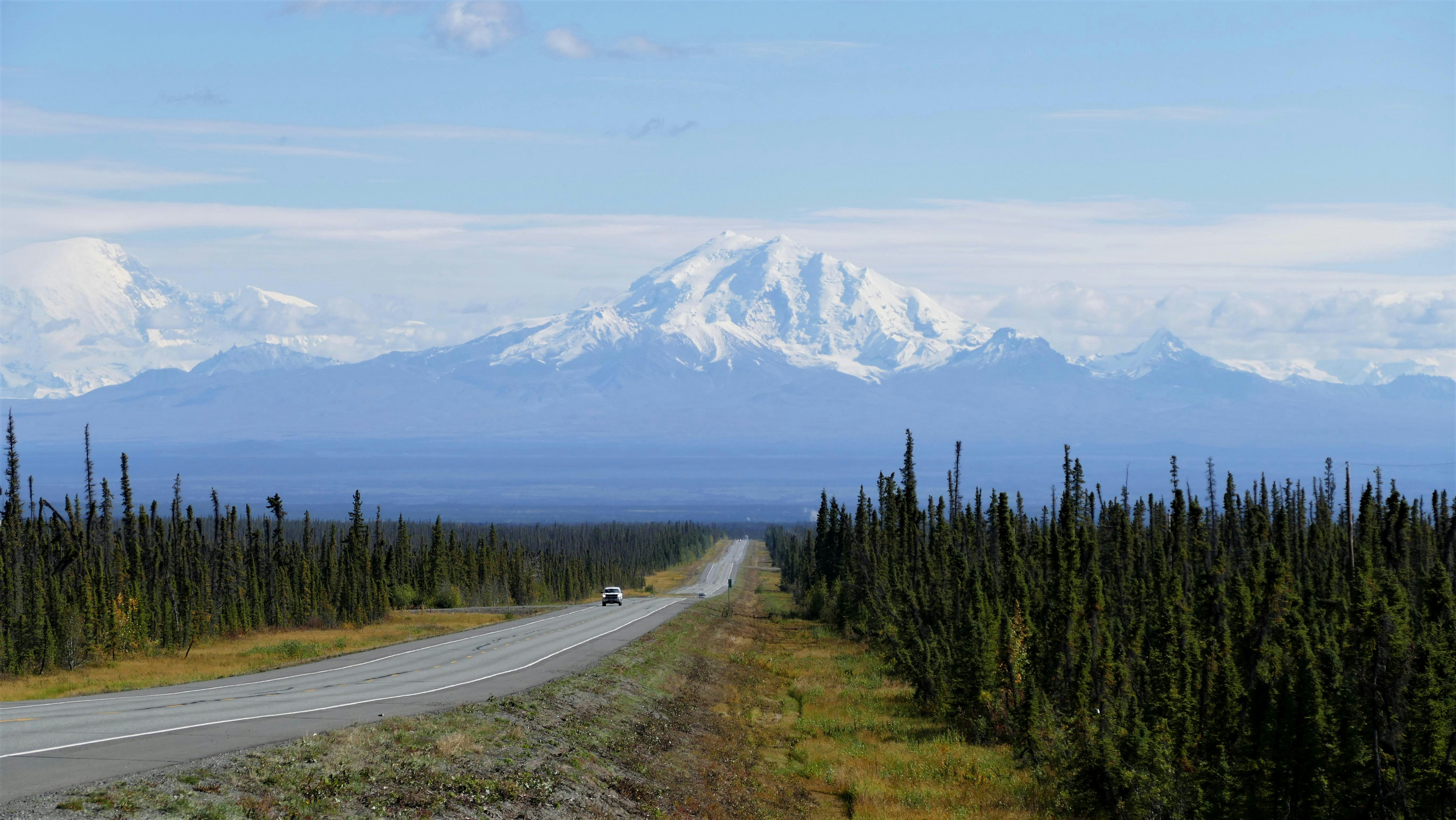 Long and empty road in Alaska - Mount Drum