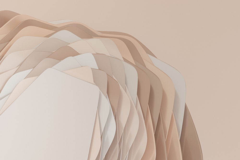 a group of abstract shapes on a beige background