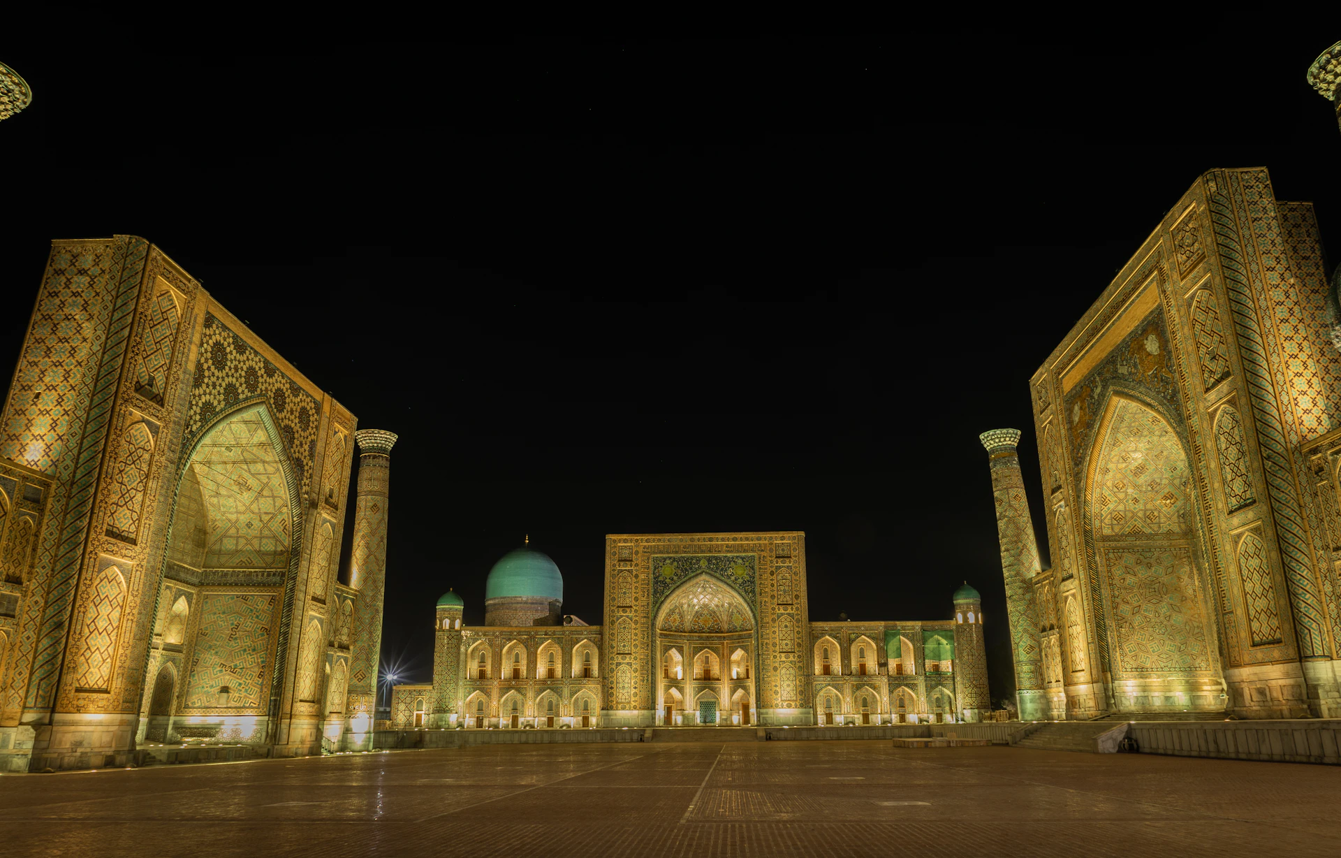 Registan Square at night in Samarkand, Uzbekistan