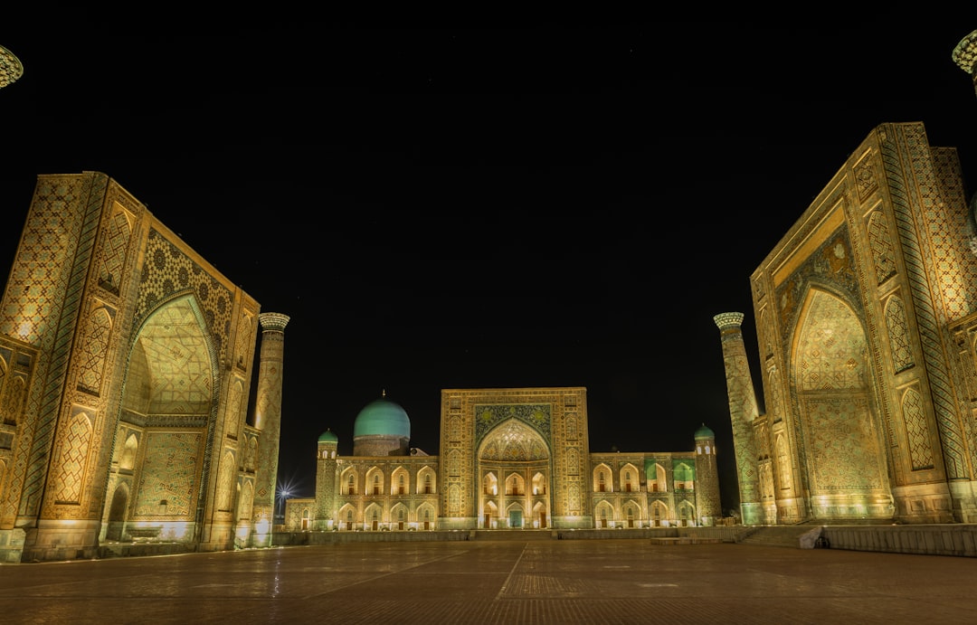 a large building that has a lot of lights on it,