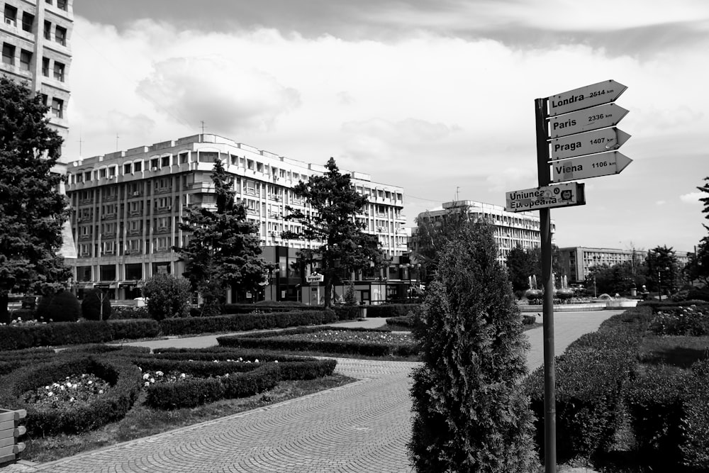 a black and white photo of a street sign