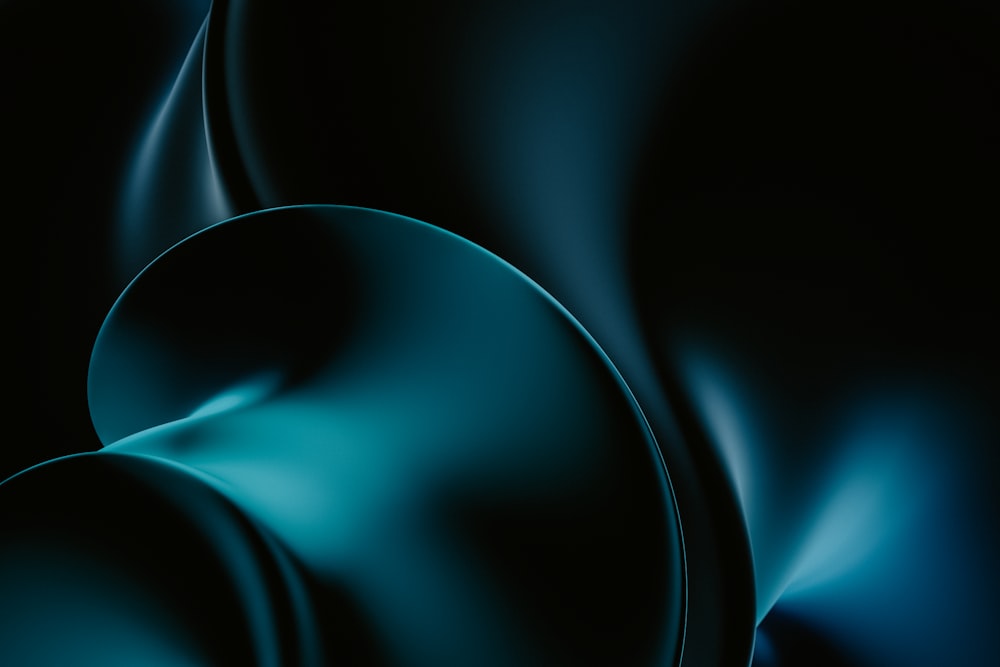 uno sfondo nero e blu con curve