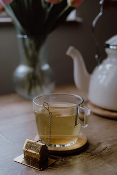 a cup of tea on a wooden table