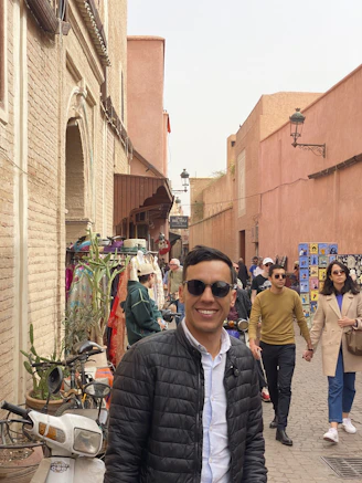 A vibrant street scene featuring dalfa sneakers on cobblestone pavement.