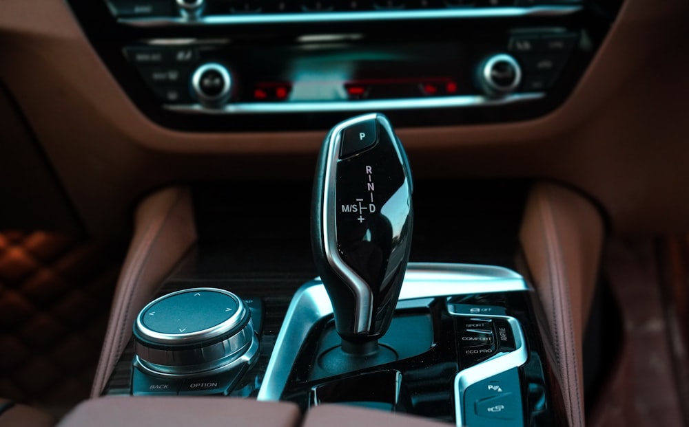 the interior of a car with an automatic gear lever