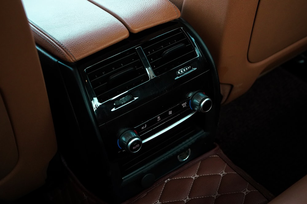 a car radio in the center console of a vehicle