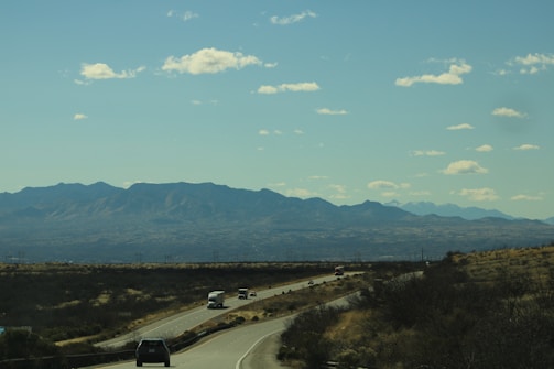 A Road to Sinai van driving along a scenic mountain road.